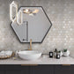 Stone beige honed crema marfil marble hexagon mosaic tile wall with subtle texture and natural veining
