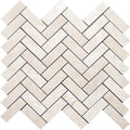 Ivory beige 12x12 polished Crema Marfil marble herringbone mosaic tile arranged in zigzag pattern