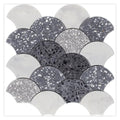 White and gray honed terrazzo and Carrara marble fan-shaped mosaic tile with varied speckled patterns