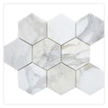 White gray Calacatta Gold honed hexagon marble mosaic tile with natural veining and gold undertones