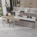 Gray matte porcelain large format wood-look tile installed on kitchen floor