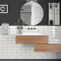 white polished ceramic subway wall tile 4x12 in bathroom setting