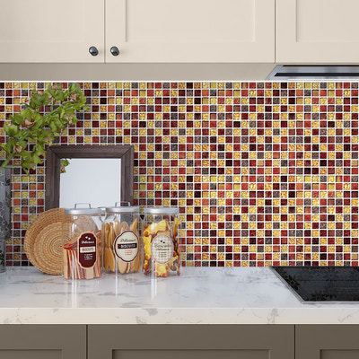 Glossy foiled glass mosaic tile in gold and red, 12x12 inches, used as kitchen backsplash.