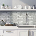 White Bianco Carrara polished marble subway mosaic tile backsplash with gray veining, 12x13 inch size