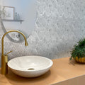 Pearl white polished diamond Bianco Carrara marble mosaic tile on bathroom wall