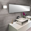 gray honed marble subway tiles 4x12 installed on bathroom wall