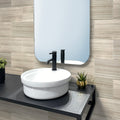Beige 12x24 inch honed marble subway tile on bathroom wall