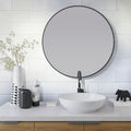 white honed Thassos marble subway tile 4x12 installed on a bathroom wall