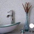 White multi-shaped glass mosaic tile with glossy matte finish on the bathroom wall surface