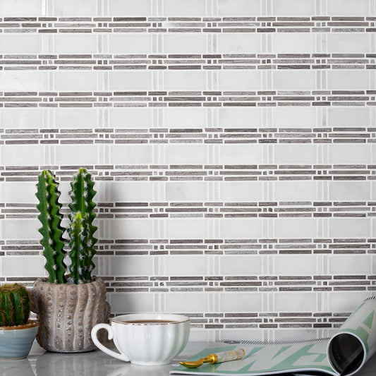 White 12x12 polished marble mosaic tile with gray accents on backsplash