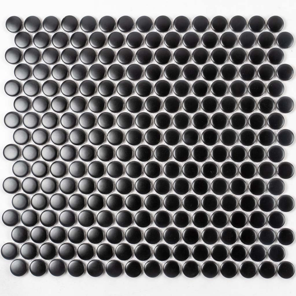 Modern black tile fireplace in a black glossy penny round porcelain mosaic tile
